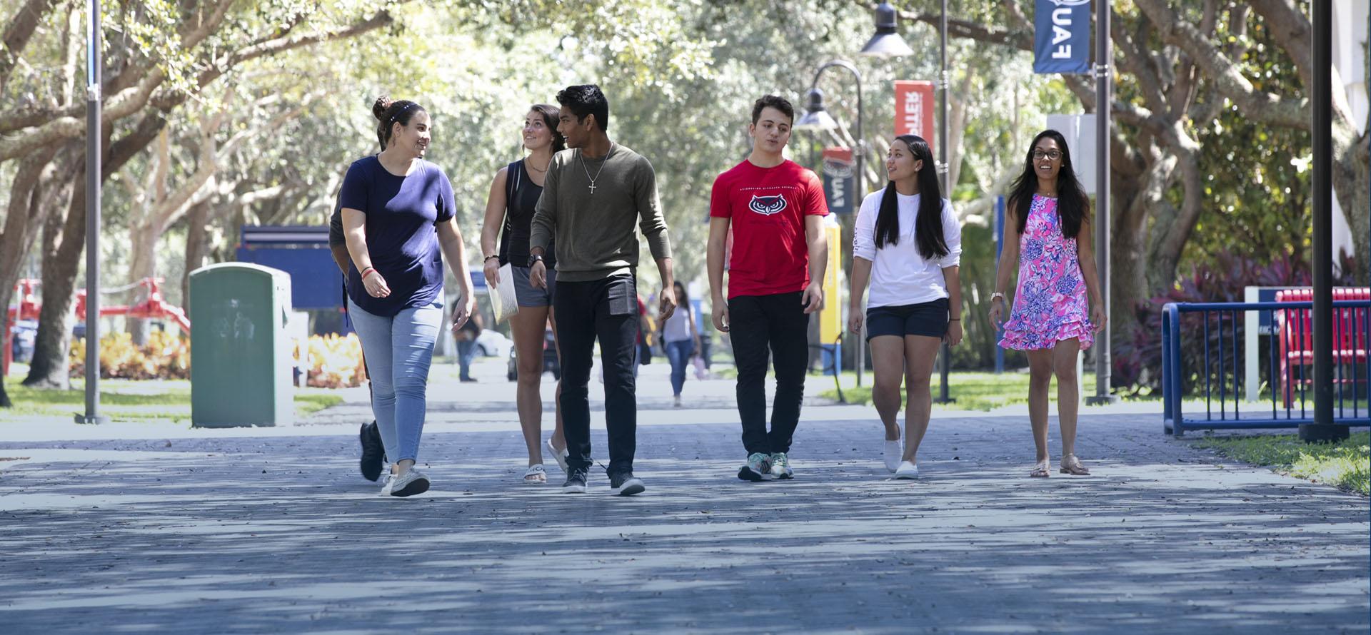 students walking the sidewalk